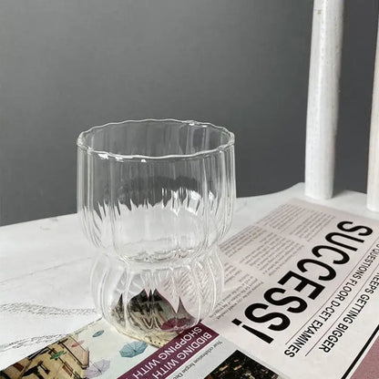 Clear glass coffee mug with fluted ribbed design and wider rim from decorbites glass coffee collection
