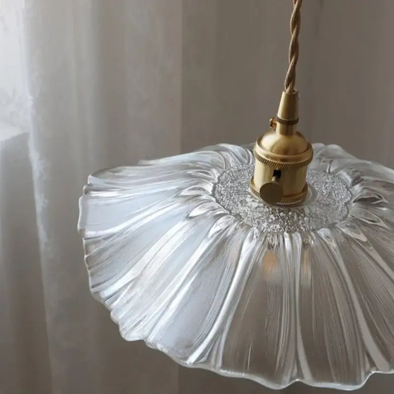 Fluted clear glass pendant light with petal-like hand-blown design and brass finish for kitchen dining decorbites clear glass