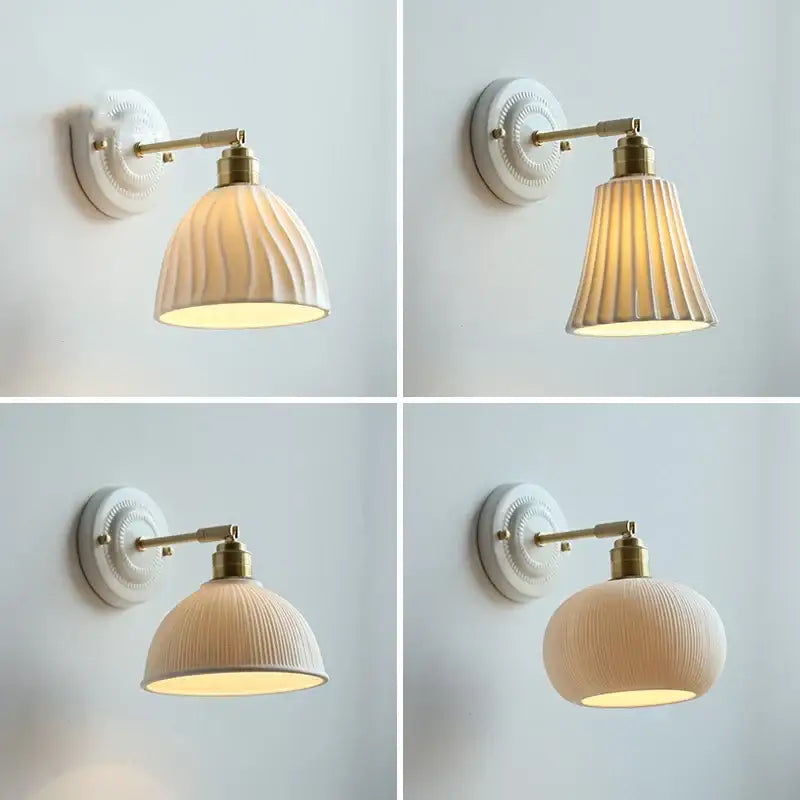 Fluted cream ceramic wall lamp with brass accents featuring a ribbed dome-shaped shade for elegant bathroom lighting decorbites ceramic wall