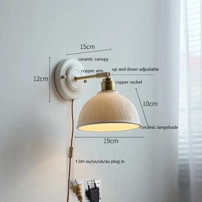 Fluted cream ceramic wall lamp with ribbed lampshade and brass-finished copper arm ideal for bathroom decorbites ceramic wall light