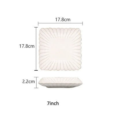 A square white ceramic dinnerware set plate with scalloped sunburst rim and ceramic white glaze by decorbites