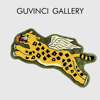 A plush olive green flying tiger leopard hand tufted rug with black spots and white wings for bedroom decorbites decor