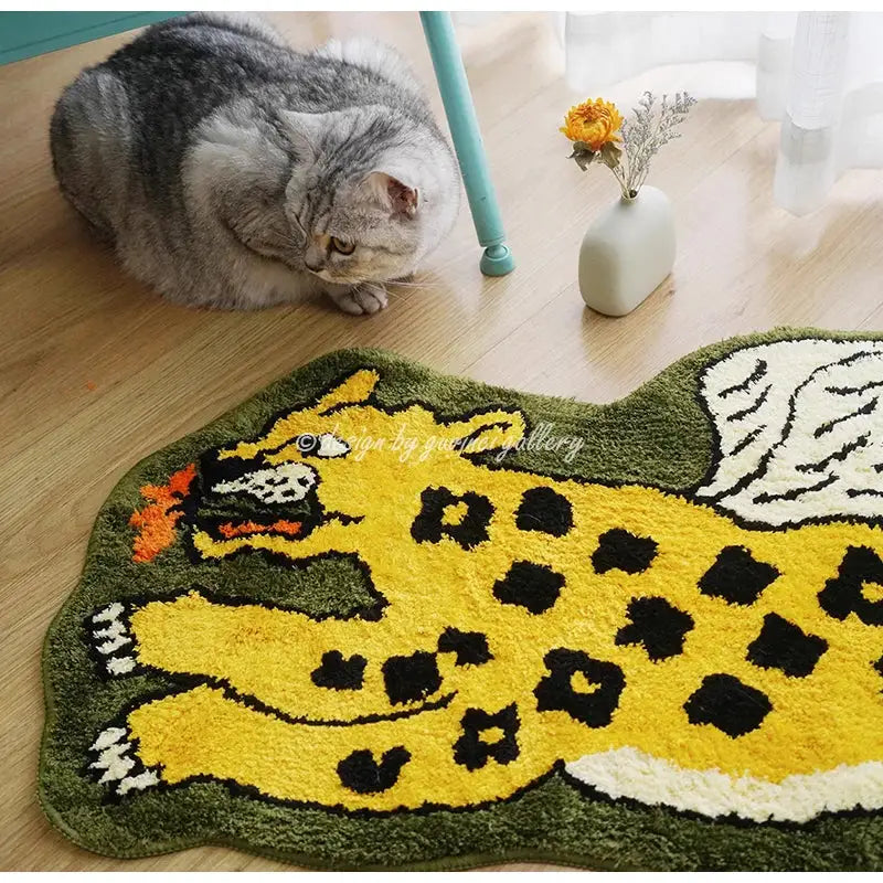 A plush yellow and black flying tiger leopard hand tufted rug with an olive green border for bedroom decor