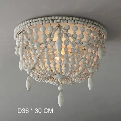 White french country wood bead chandelier with distressed finish and teardrop ornaments for bedroom or dining room