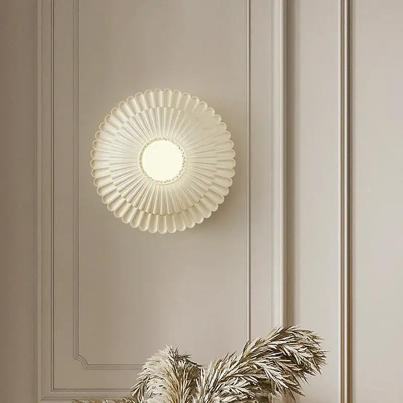 Cream-colored petal-shaped french cream wall lamp with central circular light fixture for bedroom decorbites french cream wind
