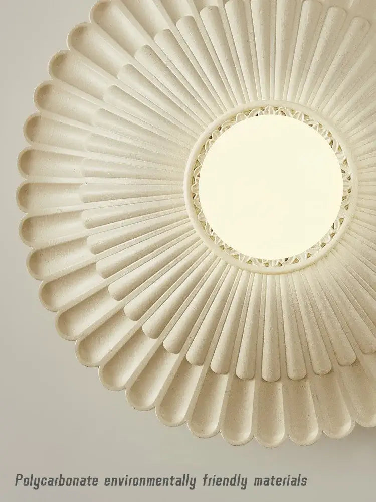 Off-white french cream petal wall lamp with sunburst design and central mirror for elegant bedroom decorbites french cream wind