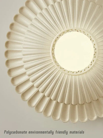 Off-white french cream petal wall lamp with sunburst design and central mirror for elegant bedroom decorbites french cream wind