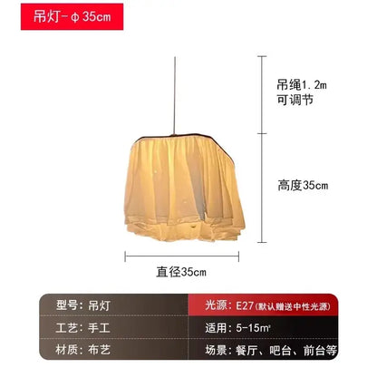 A warm-toned sheer fabric pendant light with 35cm diameter in decorbites french design led style for dining room decor