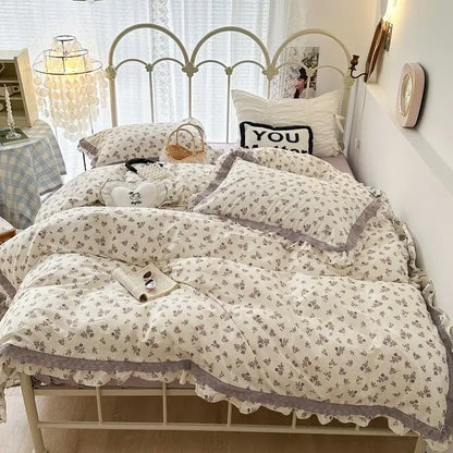 Cream-colored floral bedding set with delicate gray double layer lace ruffles and soft cozy texture for bedroom use