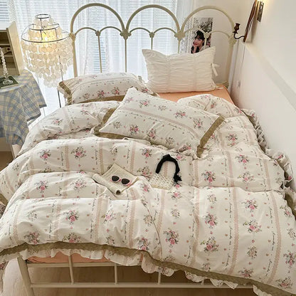 Cream-colored floral bedding set with double layer lace ruffles and delicate lace trim for elegant bedroom decor