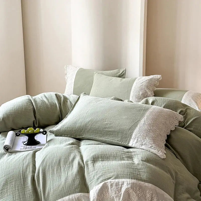 Soft sage green linen bedding set with delicate white lace trim featuring decorbites french lace cotton accents