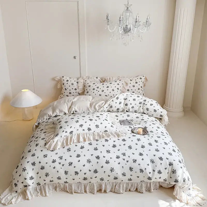 White cotton bedding set with delicate ruffles and lace trim featuring decorbites french lace floral design