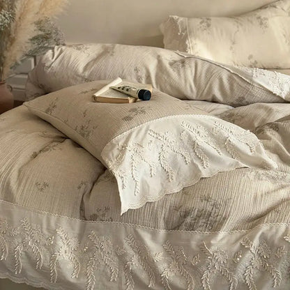 Beige linen duvet set with delicate white floral embroidery and scalloped lace trim in french lace flowers bedding set