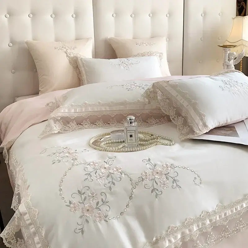 Elegant ivory satin bedding set with delicate pink and silver floral embroidery and lace trim decorbites french lace flowers