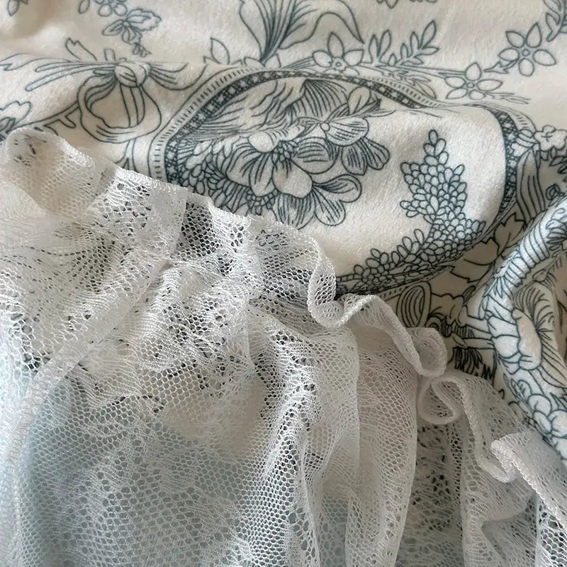 White lace ruffle with delicate intricate mesh pattern on blue and white bedding set decorbites french lace ruffles