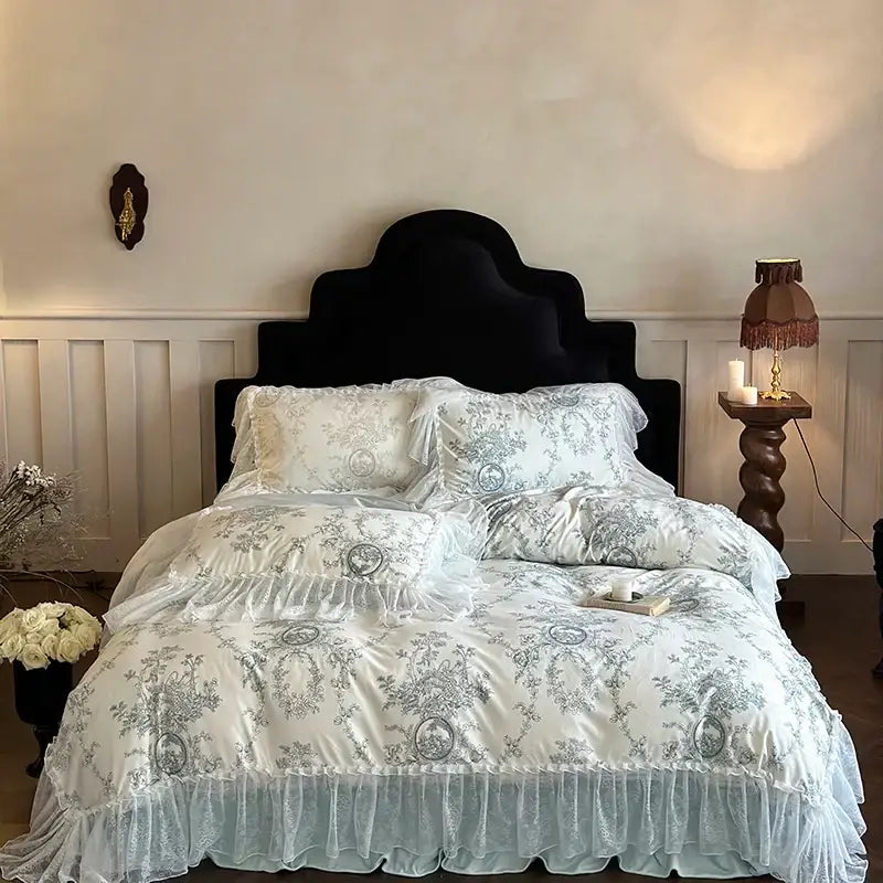 A delicate white and light blue floral bedding set with french lace ruffles and ruffled lace trim by decorbites french lace
