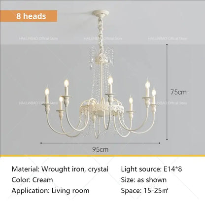 Cream-colored french light luxury chandelier with eight ornate wrought iron arms and crystals for living room decorbites decor