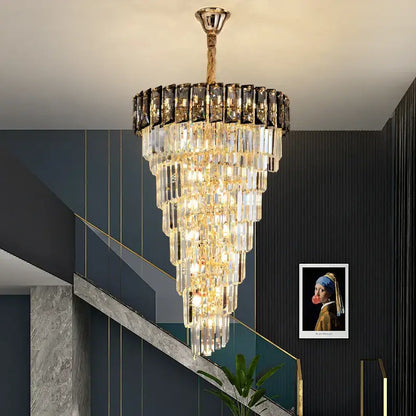 French luxury amber crystal chandelier with multi-tiered clear and black prisms suspended by gold chain for living room