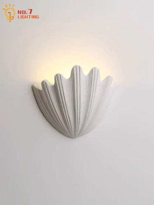 White shell-shaped wall lamp with ribbed gypsum design for bedroom decorbites french medieval style lighting
