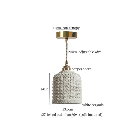White ceramic pendant light with textured woven pattern and brass accents for decorbites french minimalism ceramic dining room