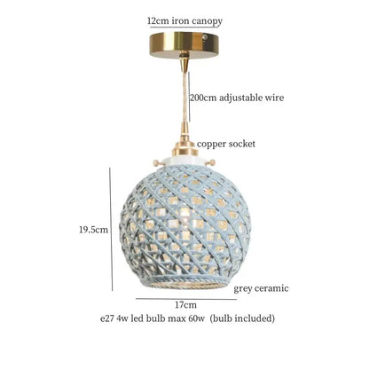 A spherical pendant light with a woven grey ceramic shade and brass accents for decorbites french minimalism ceramic decor