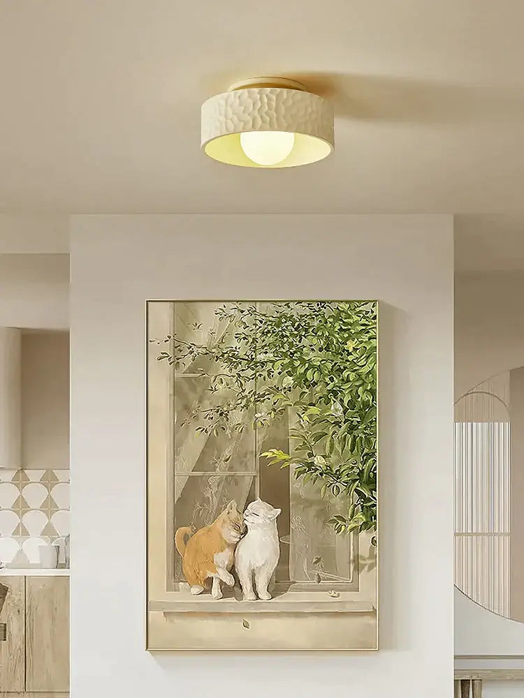 A decorbites french minimalist cream ceiling light with a textured off-white shade and gold-toned metallic rim for living room decor