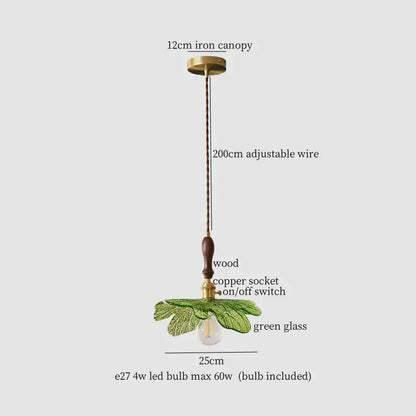 Green glass pendant lamp with brass iron canopy wooden handle and copper socket by decorbites copper wood glass