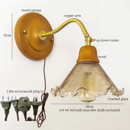 French vintage copper wall sconce with warm wood canopy brass arm and textured cracked glass shade for bedroom decorbites