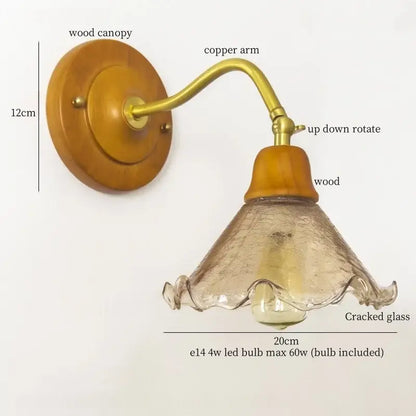 French vintage copper wall sconce with warm brass arm, wooden base, and textured crackled glass shade for bedroom decorbites