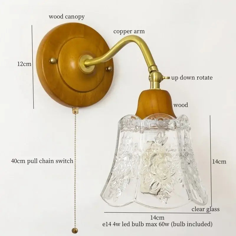 French vintage copper wall sconce with clear glass bell-shaped lampshade and floral etching on wooden canopy decorbites french vintage