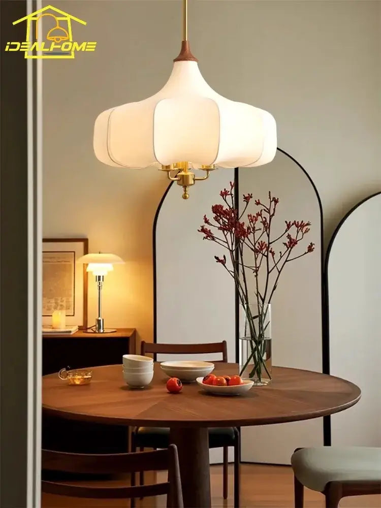 A white petal-shaped fabric pendant light with brass frame for french vintage bedroom decorbites pendant lights