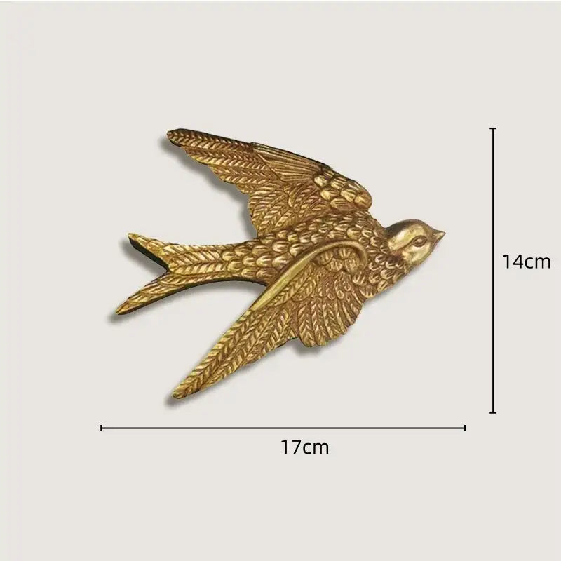 Golden swallow-shaped wall decor with textured feathers and metallic finish in french vintage cupid gold and wood frame set