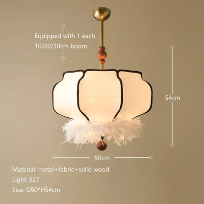 A delicate cream french vintage fabric chandelier with gold metal frame wooden accents and feather trim for dining room decorbites french vintage