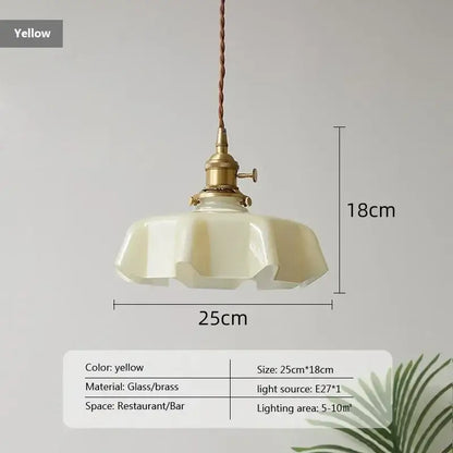 Yellow glass pendant light with brass hardware and twisted cord decorbites french vintage pendant for kitchen island decor