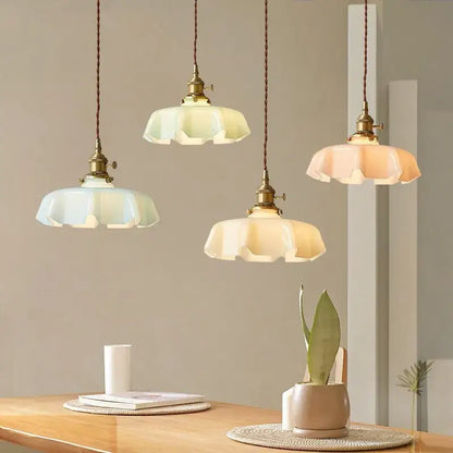 Three french vintage pendant lights with brass fixtures and pastel glass shades for kitchen island decorbites pendant light