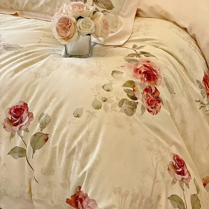 Cream-colored satin duvet cover with pink and red roses and muted green leaves in decorbites french vintage rose bedding set
