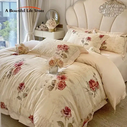 Cream-colored french vintage rose bedding set with embroidered red and pink roses on satin-like egyptian cotton fabric