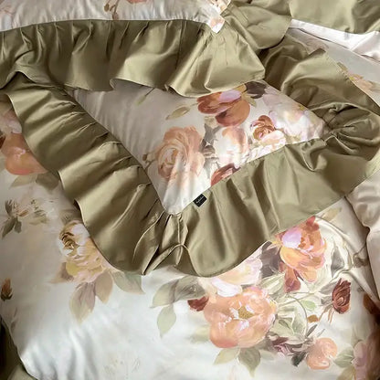 A soft olive green ruffled pillow sham with delicate peach and cream floral print in decorbites french vintage bedding set