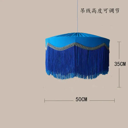 Vibrant blue fringed beauvamp tassel pendant light with silver trim for French vintage living room décor