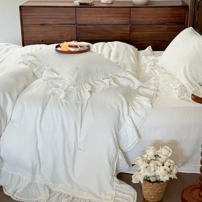 White ruffled cotton bedding set with delicate lace trim featuring double layer crinkle yarn for a vintage bedroom