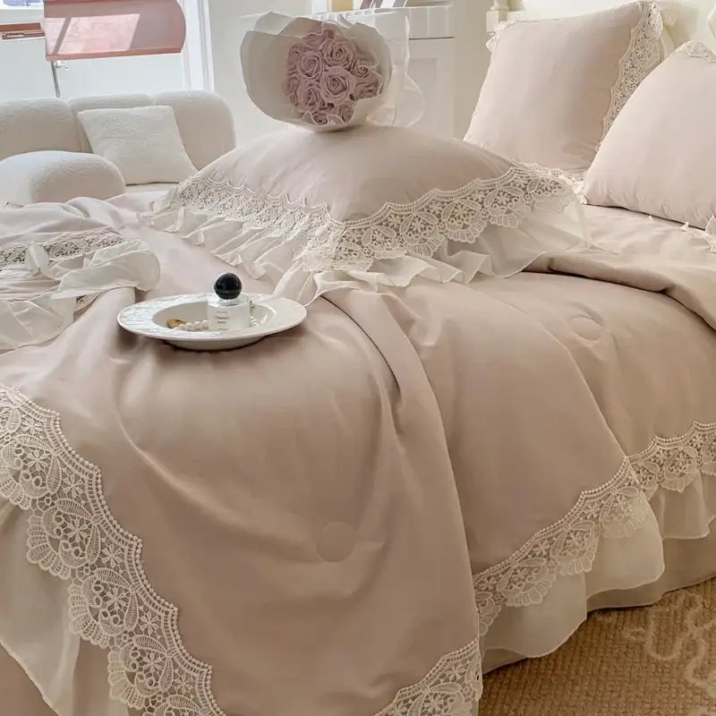 Beige lace trimmed bedding set with ruffled edges and delicate floral embroidery decorbites french wedding lace