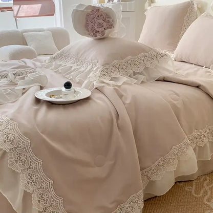 Beige lace trimmed bedding set with ruffled edges and delicate floral embroidery decorbites french wedding lace