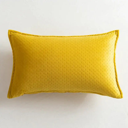 Vibrant yellow fringed velvet cushion cover with subtle quilted texture and stitched edges by decorbites for living room decor