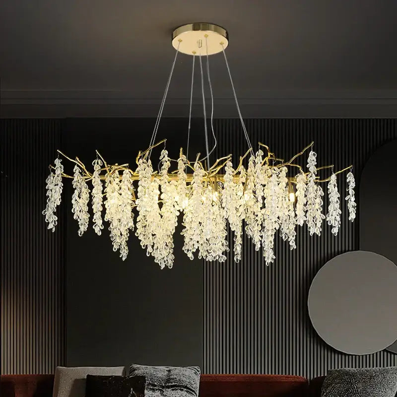 Elegant aluminum golden branch chandelier with frosted aluminum golden finish and cascading crystal droplets for dining room decorbites