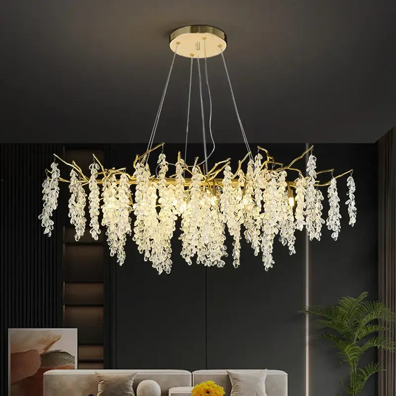 Frosted aluminum golden branch crystal chandelier with gold-toned frame and cascading clear droplets for dining room decorbites