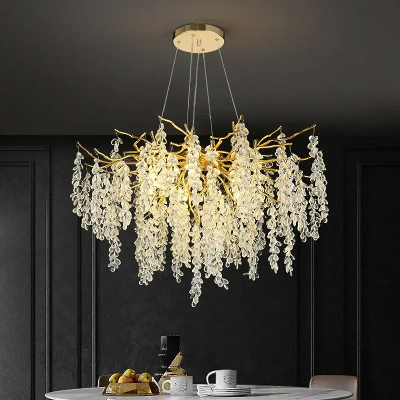 Golden branch-style chandelier with cascading clear crystal leaves in frosted aluminum golden finish for dining room decorbites frosted aluminum