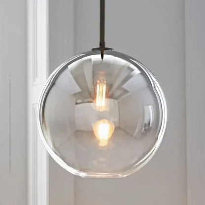 Clear glass ball pendant light with dark metal chain for dining room decorbites glass ball pendant light