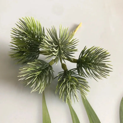 Artificial green pine-like foliage cluster with spiky needle leaves in frosted greenery berry stamen bundle decorbites greenery berry