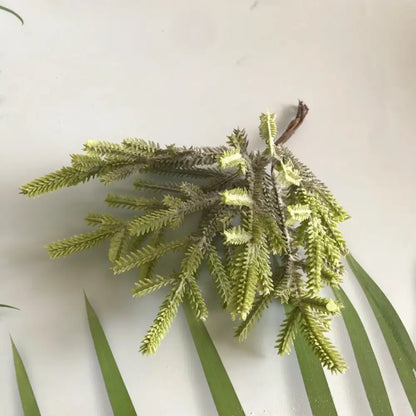 A light green artificial evergreen greenery berry stamen bundle with feathery foliage for living room decorbites decor