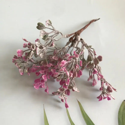 A delicate artificial frosted greenery berry stamen bundle with pink blossoms and silver leaves for living room decorbites decor